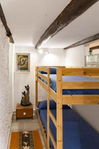 Postel nebo postele na pokoji v ubytování La Scogliera