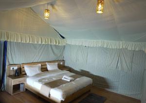 Postel nebo postele na pokoji v ubytování Baromas Resort and Camping