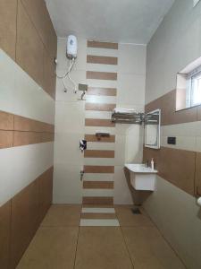 Koupelna v ubytování Royce Resort