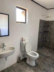 Koupelna v ubytování The Legacy + 11 fotografií