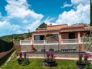 a villa with a swimming pool and a house at Villa Jenuska, Attractive holiday home in Callian with private pool in Callian