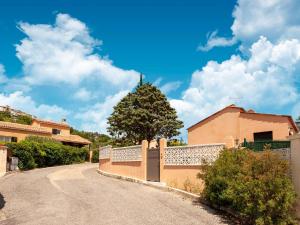 a road in front of a house with a tree at Villa Jenuska, Attractive holiday home in Callian with private pool in Callian