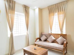 Χώρος καθιστικού στο Sree Home Stay and Service Apartment