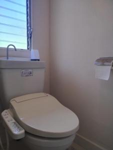 a bathroom with a white toilet and a sink at Ito - Cottage - Vacation STAY 19055 in Ito