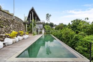 La pileta dentro o cerca de Merin Villa by Kozystay - Jimbaran