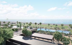 a view of the beach from the balcony of a resort at Voyage Kundu in Antalya