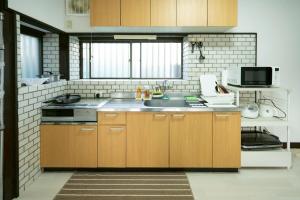 Køkken eller tekøkken på Yuハウス-宇美町-