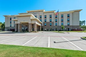 an empty parking lot in front of a hotel at Hampton Inn Texarkana in Texarkana