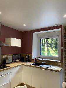 Kuchyň nebo kuchyňský kout v ubytování Gite Ranch