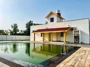 Bazén v ubytování Nature's Nest nebo v jeho okolí + 5 fotografií