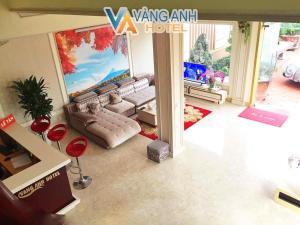 a rendering of a living room with a couch at Khách sạn Vàng Anh in Kiên Giáp Ha