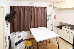 Η κουζίνα ή μικρή κουζίνα στο Vivere103ー札幌市地下鉄南平岸駅徒歩3分ーS-beds2