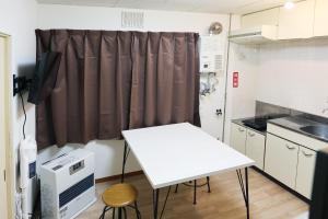 Η κουζίνα ή μικρή κουζίνα στο Vivere103ー札幌市地下鉄南平岸駅徒歩3分ーS-beds2