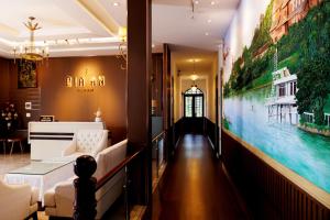 Postel nebo postele na pokoji v ubytování Gia An - hotel in Dalat