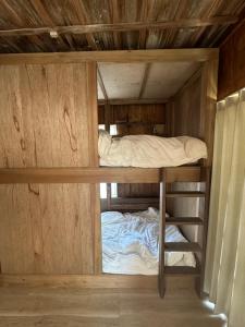 Ένα ή περισσότερα κρεβάτια σε δωμάτιο στο ゲストハウス架け橋