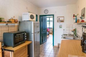 Kuchyň nebo kuchyňský kout v ubytování Spitzwegerich