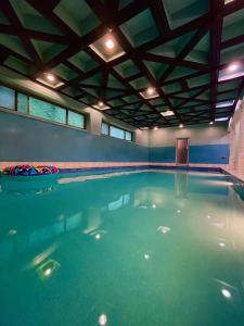 Bazén v ubytování Aazaan's Paradise nebo v jeho okolí