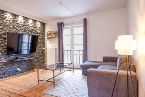 Posezení v ubytování Cozy 2-Bedroom apt