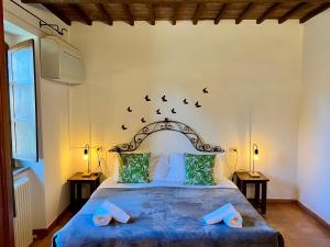 Postel nebo postele na pokoji v ubytování Agriturismo Podere La Fornace + 154 fotografií