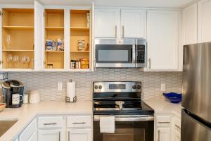 Kuchyň nebo kuchyňský kout v ubytování The Groovy Blue