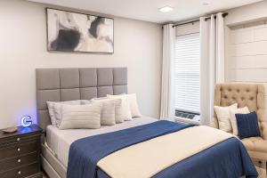 Postel nebo postele na pokoji v ubytování The Groovy Blue