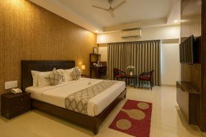 Postel nebo postele na pokoji v ubytování Hotel Zion Inn, Cantonment, Varanasi