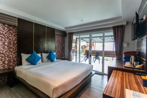 TV a/nebo společenská místnost v ubytování Coco Bella Hotel