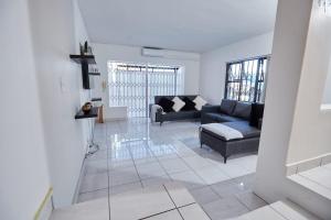 Χώρος καθιστικού στο Townhouse in Bloubergstrand