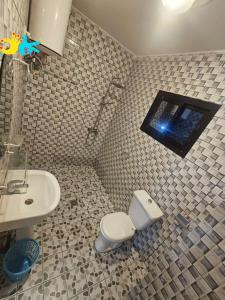 Ένα μπάνιο στο Résidence Didi