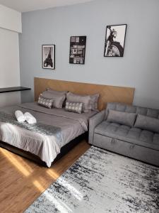 Posezení v ubytování WANida Suite At Al Waqaf Resident Bandar Baru Tunjung + 20 fotografií