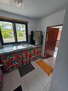 TV a/nebo společenská místnost v ubytování Fare RekaReka - Fakarava