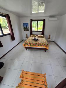 Postel nebo postele na pokoji v ubytování Fare RekaReka - Fakarava