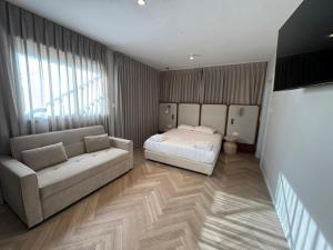 Postel nebo postele na pokoji v ubytování Villa Renso Eilat