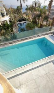 Bazén v ubytování Villa Renso Eilat nebo v jeho okolí