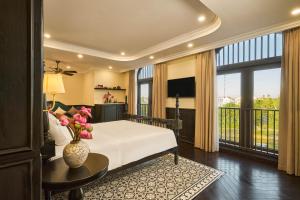 Ένα ή περισσότερα κρεβάτια σε δωμάτιο στο Lumiere Boutique Vỹ Dạ