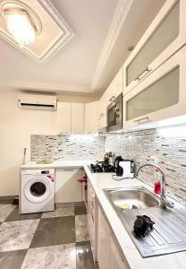 Kuchyň nebo kuchyňský kout v ubytování ASTRA Home