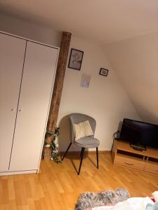 Μια τηλεόραση ή/και κέντρο ψυχαγωγίας στο Ferienwohnung am Westerntor Jule inkl Parkplatz