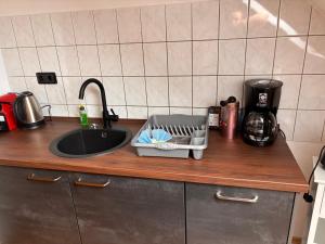 Η κουζίνα ή μικρή κουζίνα στο Ferienwohnung am Westerntor Jule inkl Parkplatz +5 φωτογραφίες