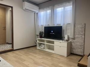 Μια τηλεόραση ή/και κέντρο ψυχαγωγίας στο 遇見民宿