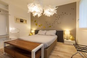 Ένα ή περισσότερα κρεβάτια σε δωμάτιο στο Casa Stucky