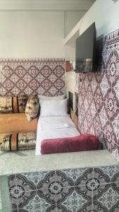 Postel nebo postele na pokoji v ubytování Maison Bab boujloud