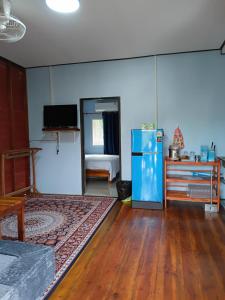 TV a/nebo společenská místnost v ubytování Cha Bungalow