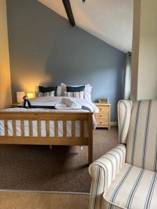 Ένα ή περισσότερα κρεβάτια σε δωμάτιο στο Halfway Inn