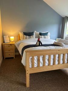 Ένα ή περισσότερα κρεβάτια σε δωμάτιο στο Halfway Inn