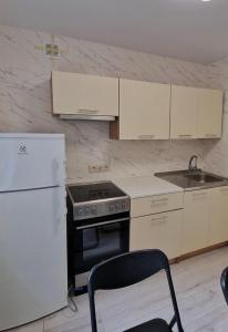 Kuchyň nebo kuchyňský kout v ubytování Pas Dianą 1 aukštas + 2 fotografie