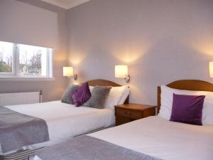 Ένα ή περισσότερα κρεβάτια σε δωμάτιο στο west park hotel PVT ltd