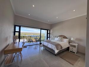 Ένα ή περισσότερα κρεβάτια σε δωμάτιο στο 17 Kromme River Estate