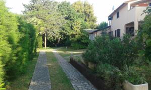 En have udenfor Apartments with parking space Barbariga, Fazana - 11193