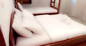 Postel nebo postele na pokoji v ubytování Résidence Hôtelière l'Océane