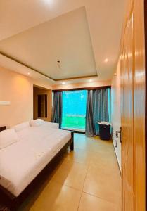 Ένα ή περισσότερα κρεβάτια σε δωμάτιο στο Ruby home stay +37 φωτογραφίες